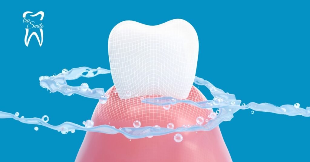 A stylized image of a tooth with a grid overlay, surrounded by splashing water, set against a blue background. The 'tru Smile' logo is in the top left corner.