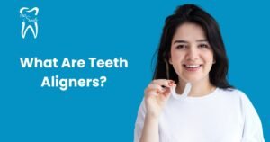 Person holding a clear teeth aligner with the text 'What Are Teeth Aligners?' and a tooth logo with 'tru Smile' on a blue background.